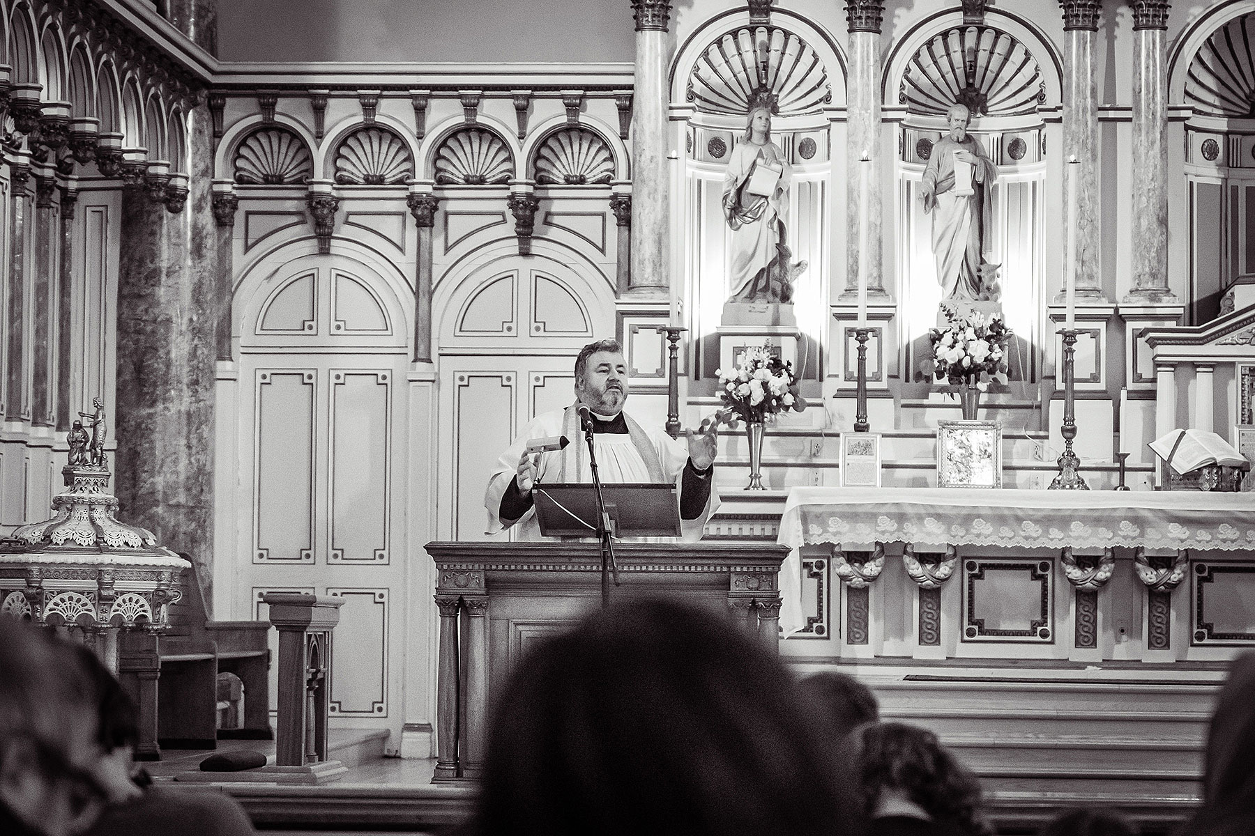 Father Dupré preaches his homily.